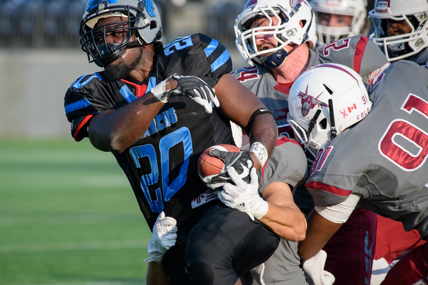 Monarchs running back powering through tackles vs Fighter Jets