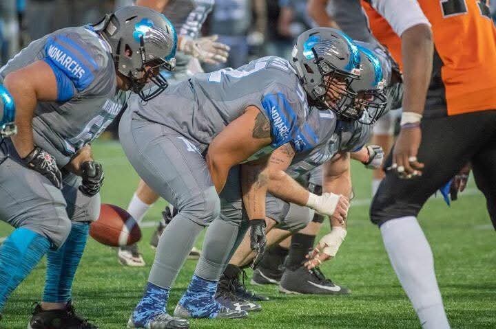 Monarchs offensive line set at the line of scrimmage