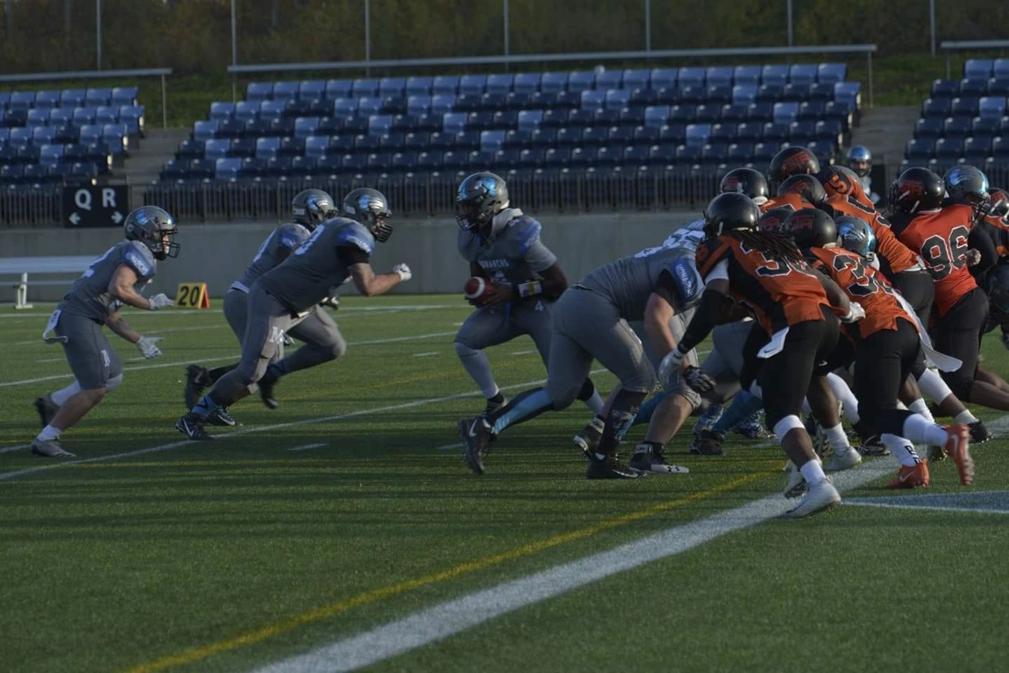Monarchs offense running a play against the Pandas at SMS Stadium